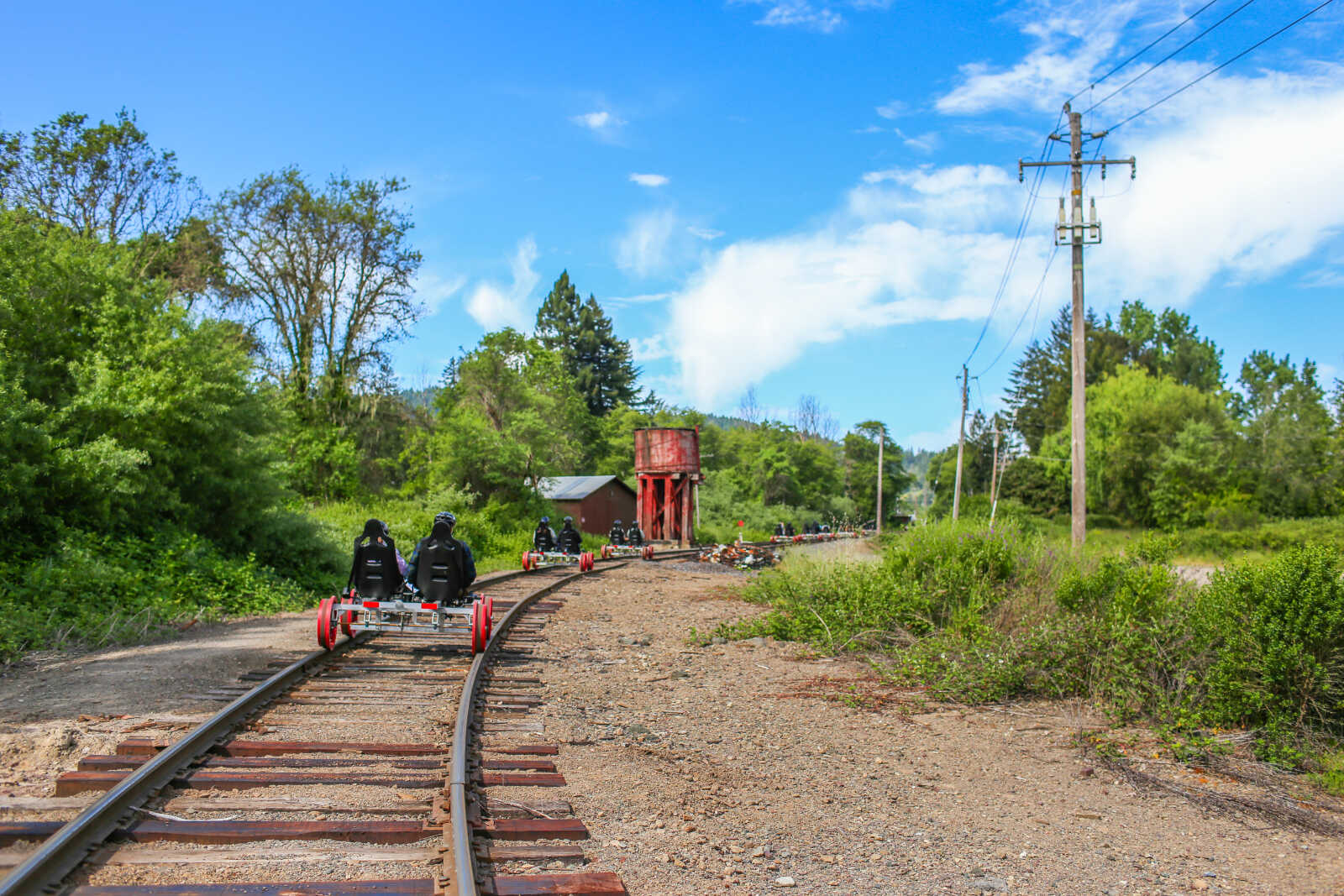 Railbikes traveling through scenic landscapes in Willits in Northern California.