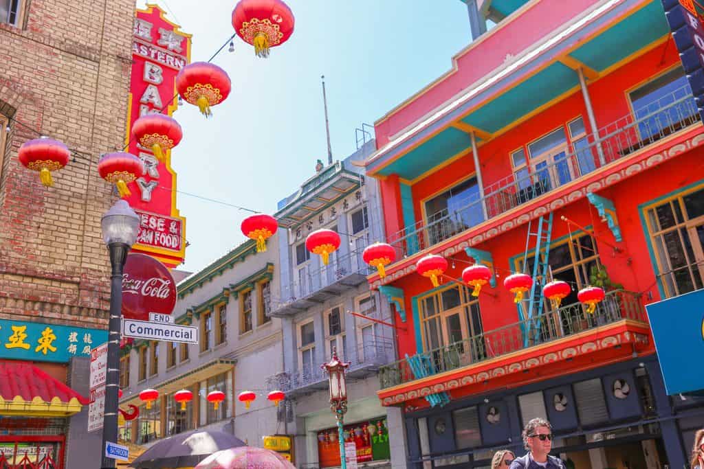 Red lanterns and colorful buildings on Commercial Street in Chinatown in San Francisco.